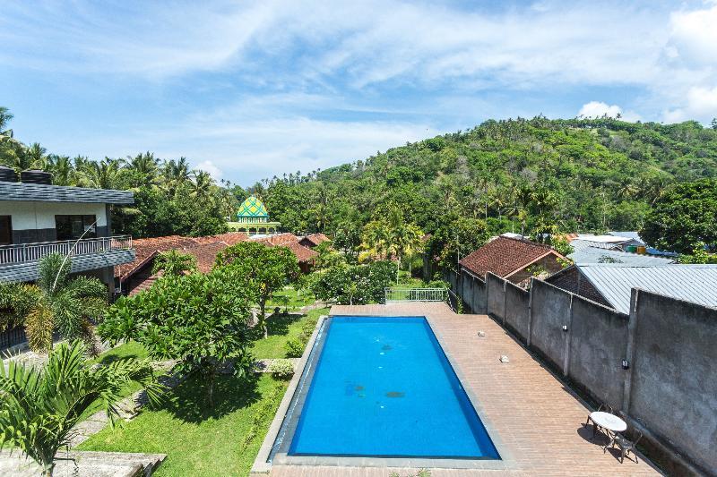 Hotel Bumi Aditya Сенггиги Экстерьер фото